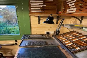 Typesetting in the garden studio of shed - The Ptolemaic Press, Wiltshire